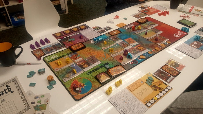The Oath Board Game Pre-Production copy laid out on a white table.