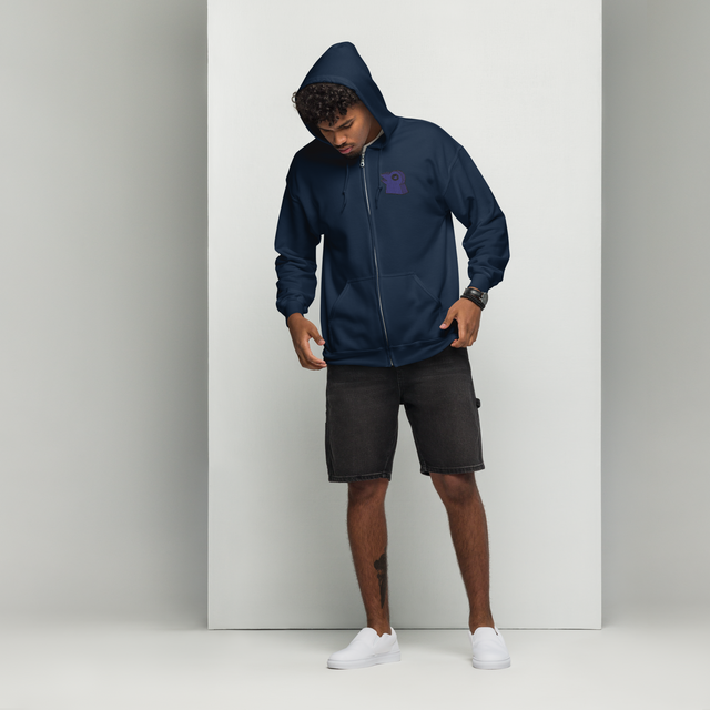 Model wearing navy zip hoodie with embroidered corvid conspiracy meeple on left chest