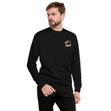Model wearing a black crewneck sweatshirt with the Underground Duchy meeple embroidered on the left chestProduct mockup