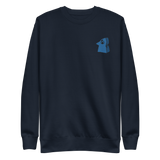 Navy crewneck sweatshirt with the Eyrie meeple embroidered on the left chest.