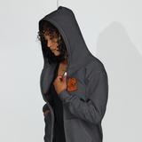 Model wearing Dark Grey zip hoodie with Marquise Meeple embroidered on left chest