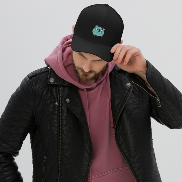 Model wearing a Black baseball cap featuring the Riverfolk Company's VP marker embroidered on the front.