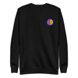 A black crewneck sweatshirt with the Chancellor Mask from Oath embroidered on the left chest.