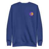 A blue crewneck sweatshirt with the Chancellor Mask from Oath embroidered on the left chest.