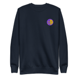 A navy crewneck sweatshirt with the Chancellor Mask from Oath embroidered on the left chest.