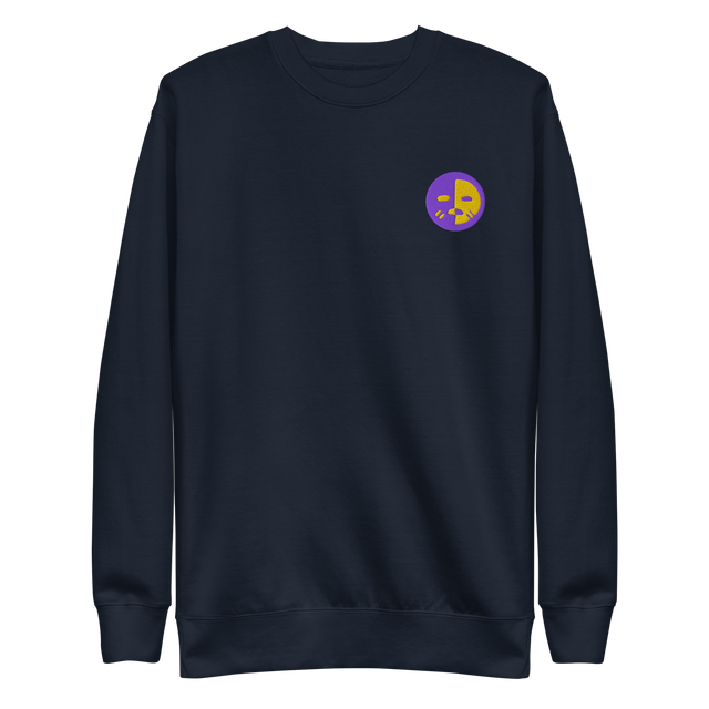 A navy crewneck sweatshirt with the Chancellor Mask from Oath embroidered on the left chest.