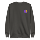 A slate grey crewneck sweatshirt with the Chancellor Mask from Oath embroidered on the left chest.