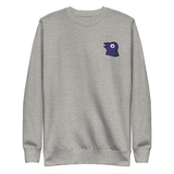 A light grey crewneck with the Corvid Conspiracy meeple embroidered on the left chest.