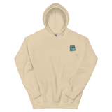 A sand-colored hoodie with the Riverfolk Company otter meeple embroidered on the left chest.