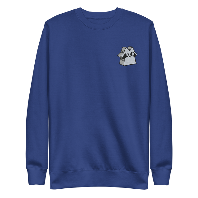 Blue crewneck sweatshirt with the raccoon vagabond meeple embroidered on the left chest. 