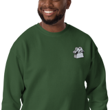 A model wearing a Green crewneck sweatshirt with the Raccoon Vagabond meeple embroidered on the left chest.