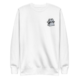 White crewneck sweatshirt with the raccoon vagabond meeple embroidered on the left chest. 