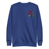 A blue crewneck sweatshirt with the Vast: The Mysterious Manor characters embroidered on the left chest.