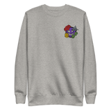 A light grey crewneck sweatshirt with the Vast: The Mysterious Manor characters embroidered on the left chest.