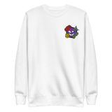 A white crewneck sweatshirt with the Vast: The Mysterious Manor characters embroidered on the left chest.