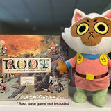 The plush version of Margot the Marquis de Cat leader, next to the Root game box